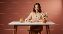 Smiling Woman Journaling at Minimalist White Table