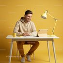 Smiling Man Working at Desk in Stylish Yellow Home Office