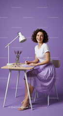 Smiling Woman Writing Notes in Lavender Home Office