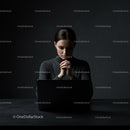 Business Woman in Deep Concentration Working on Laptop