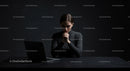 Pensive Woman Contemplating at Desk with Laptop