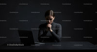 Pensive Woman Contemplating at Desk with Laptop