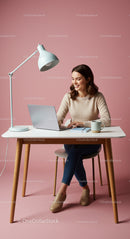 Woman Working on Laptop in a Modern Home Office