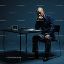 Contemplative Businessman in Modern Office Setting
