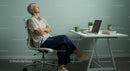 Serene Woman Relaxing in Modern Home Office