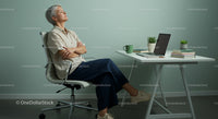 Serene Woman Relaxing in Modern Home Office