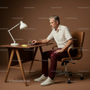 Mature Businessman Working in a Modern Office Setting