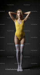 Confident Woman in Yellow Swimsuit with High Socks