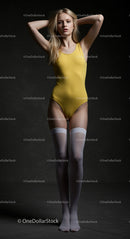 Elegant Woman Posing in Yellow Swimsuit and Stylish Socks