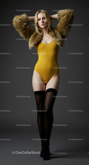 Fashion Model in Yellow Swimsuit and Fur Jacket