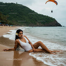 Woman in White Swimsuit Relaxing on Tropical Beach