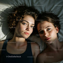 Two Women Relaxing Together in Natural Sunlight