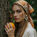 Fashionable Woman with Orange and Trendy Headscarf