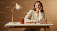 Smiling Woman at Minimalist Desk in Warm Cozy Office