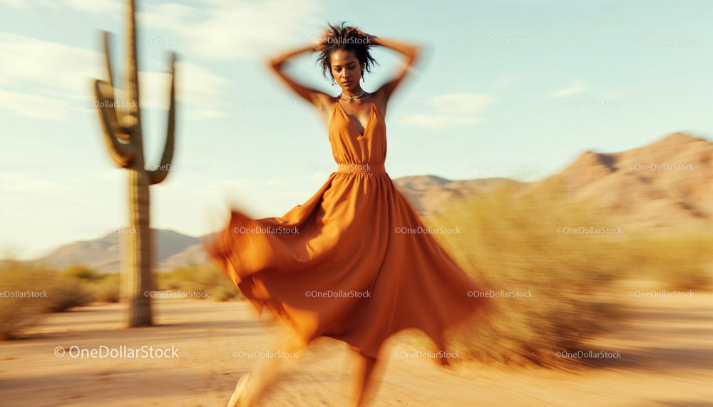 Woman Dancing in Flowing Dress in Desert Landscape