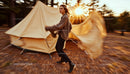 Woman in Stylish Sweater Enjoying Autumn Camping