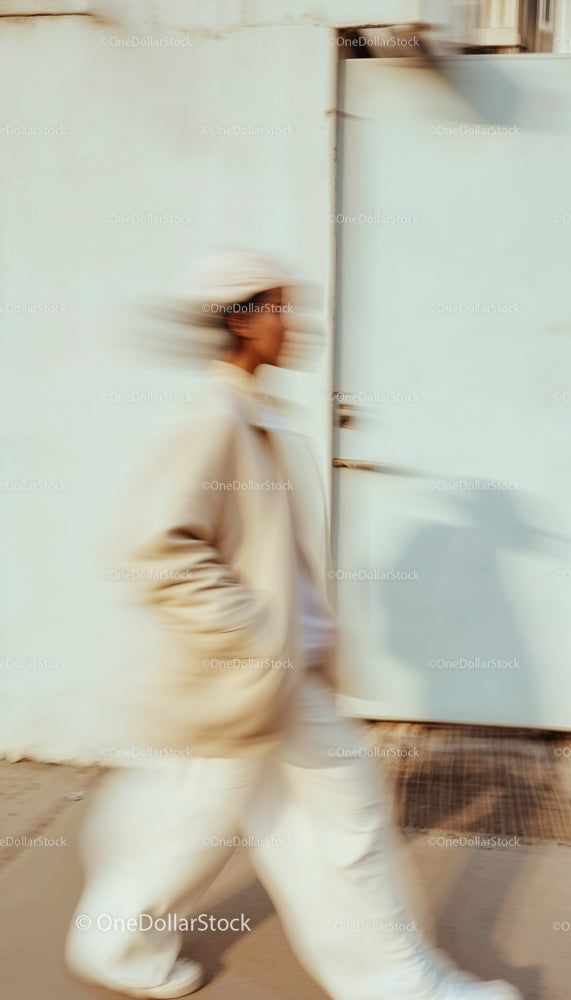 Blurred Motion of Person Walking in Urban Setting