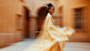 Elegant Woman in Flowing Dress Walking Through Urban Scene