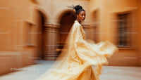 Elegant Woman in Flowing Dress Walking Through Urban Scene