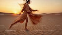 Elegant Woman Running in Desert at Golden Sunset