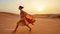 Woman Running in Desert During Sunset