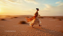 Woman in Flowing Dress Running Across Desert at Sunset