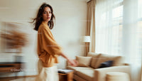 Stylish Woman in Cozy Modern Living Room