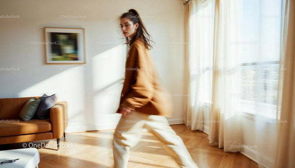 Young Woman in a Sunlit Modern Living Room Interior