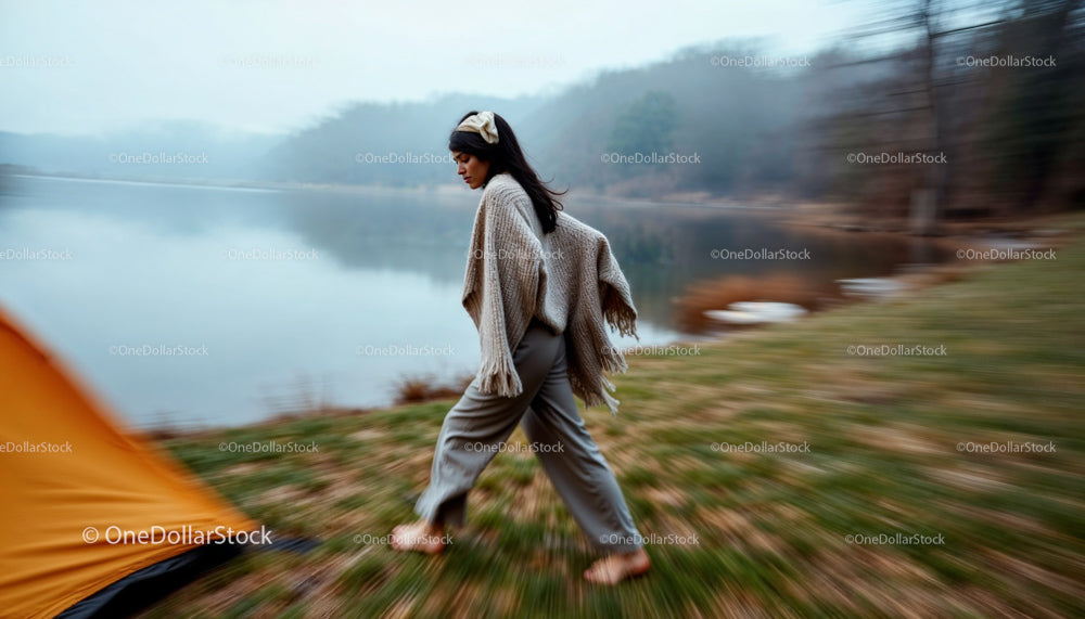 Woman Walking Barefoot by the Misty Lake