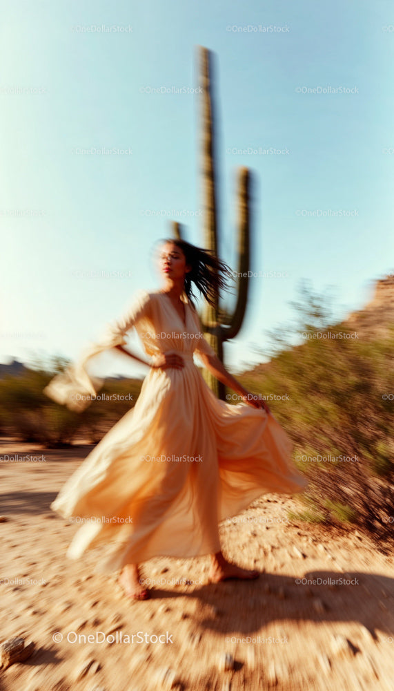 Blurred Movement of Woman in Beige Dress in Desert