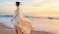 Woman in Flowing Dress Walking Along Beach at Sunset
