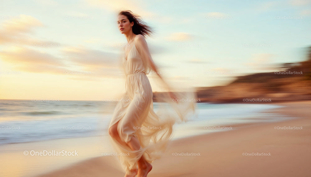 Ethereal Woman in Flowing Dress at Sunset Beach