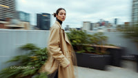 Stylish Woman in Beige Trench Coat on Rooftop Terrace