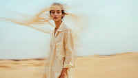 Portrait of a Woman in a Desert with Flowing Hair
