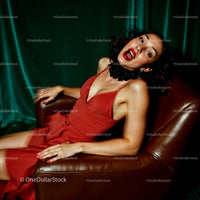 Elegant Woman in Red Dress in Luxurious Setting