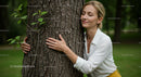 Woman Embracing Tree in Tranquil Nature Setting
