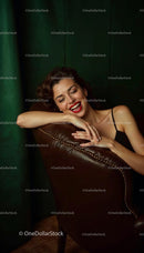 Smiling Woman Relaxing on Leather Chair in Vintage Setting