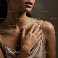 Elegant Woman with Moisturized Skin in Minimalist Setting