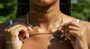 Stylish Woman Wearing Gold Necklace and Tattoos