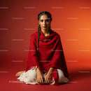Woman in Red Shawl with Braided Hair Against Orange Backdrop