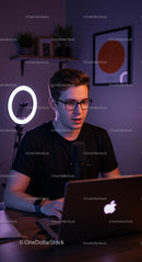 Young Man Recording Podcast in Modern Home Studio