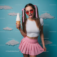 Playful Girl Enjoying Ice Cream in Trendy Pink Skirt