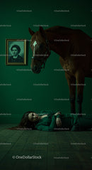 Woman in Green Suit with Chestnut Horse by Emerald Wall