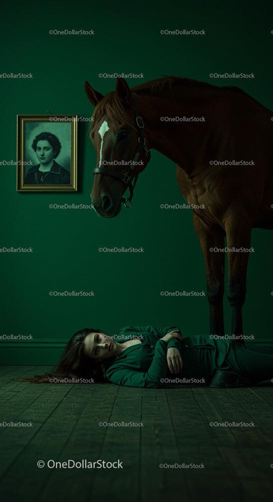 Woman in Green Suit with Chestnut Horse by Emerald Wall