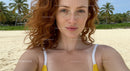 Redhead Woman Enjoying Tropical Beach Paradise