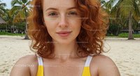 Woman with Red Hair Relaxing on a Tropical Beach
