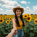 Happy Woman in Sunflower Field Holding Sunflowers