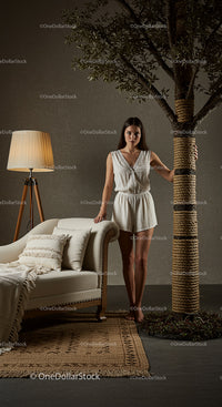 Stylish Woman in Modern Interior with Elegant Decor