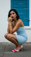 Elegant Woman in Blue Dress with Stylish Heels