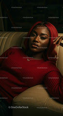 Relaxed Woman in Red Sweater on Beige Couch